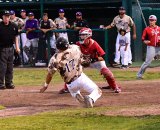 Bristol Hitchman slides at home in a 3-1 win over Hanford late in the season.